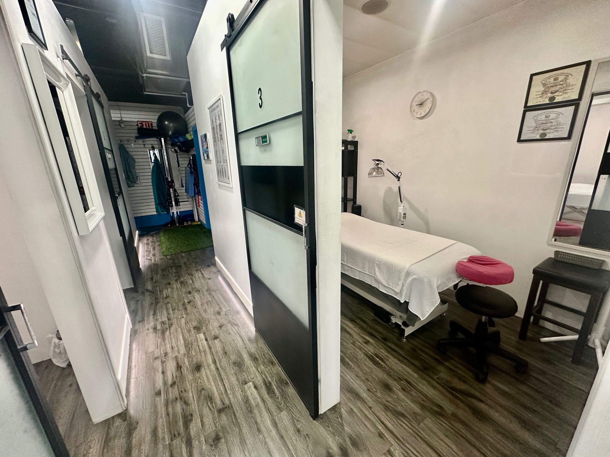Locus Health Centre hallway and treatment room interior