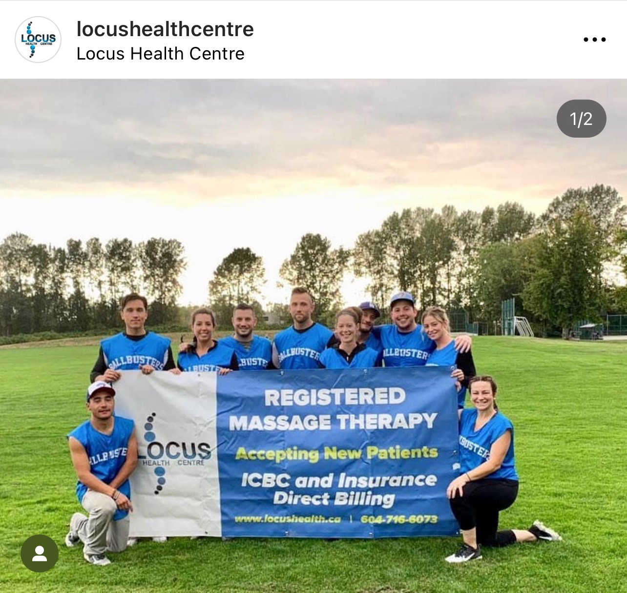 Locus Health team at community softball event with RMT banner